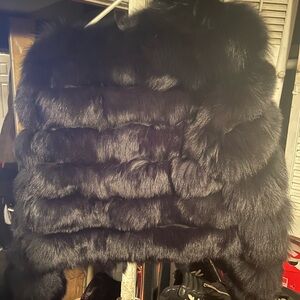 Short black fox jacket in good condition worn but kept up